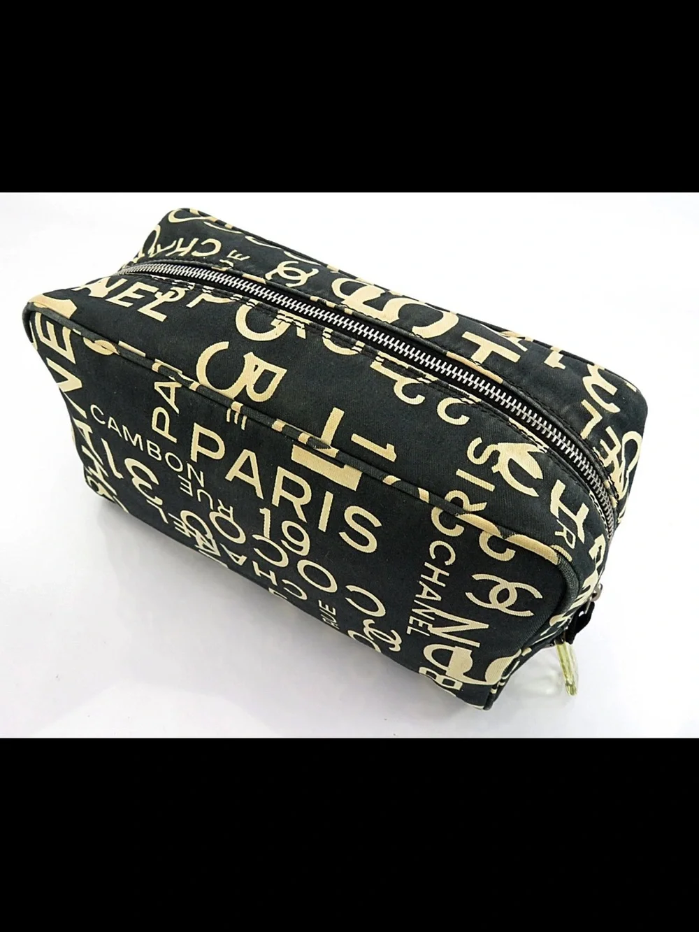CHANEL Black Canvas Logo Print Cosmetic Pouch with Cream Lettering